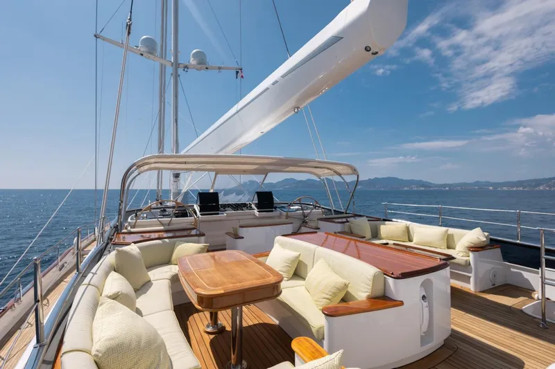 Drumbeat Yacht Photos Pics Luxurious deck of 2002 Alloy Yachts Sailing Ketch DRUMBEAT with elegant seating and ocean view.