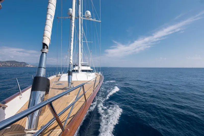 Drumbeat Yacht Photos Pics Sailing Ketch DRUMBEAT by Alloy Yachts, 2002, cruising on open sea under clear skies.