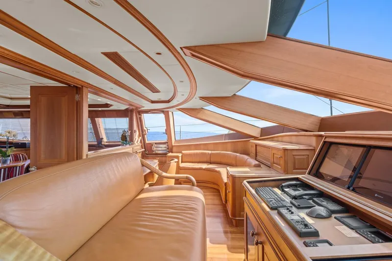 Drumbeat Yacht Photos Pics Luxurious interior of 2002 Alloy Yachts Sailing Ketch DRUMBEAT with elegant wood finishes and seating.