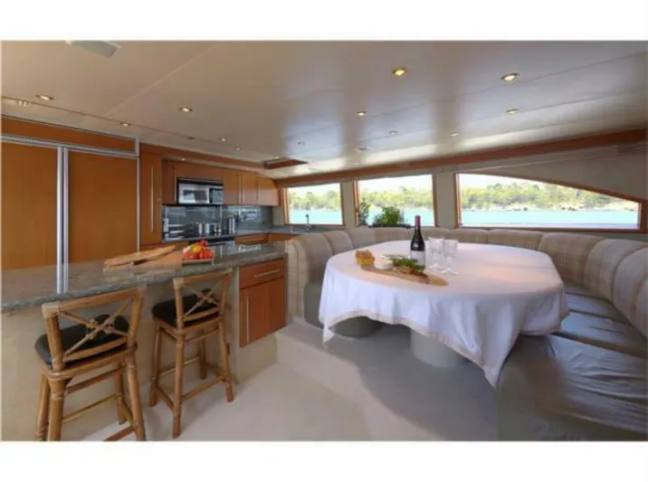 Integrity Yacht Photos Pics Luxurious interior of 2002 Westport 112 yacht with dining area and modern kitchen.