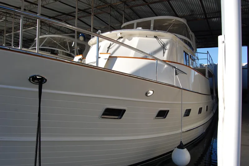 Miss Daisy Yacht Photos Pics Luxury 2005 Fleming yacht docked in a covered marina.