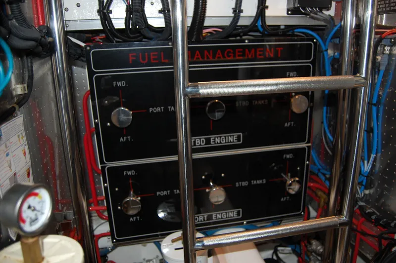 Miss Daisy Yacht Photos Pics Fuel management panel in a 2005 Fleming vessel engine room with control switches and wiring.