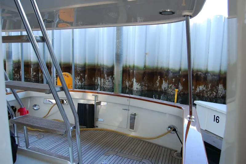 Miss Daisy Yacht Photos Pics 2005 Fleming boat deck with ladder and dock view.