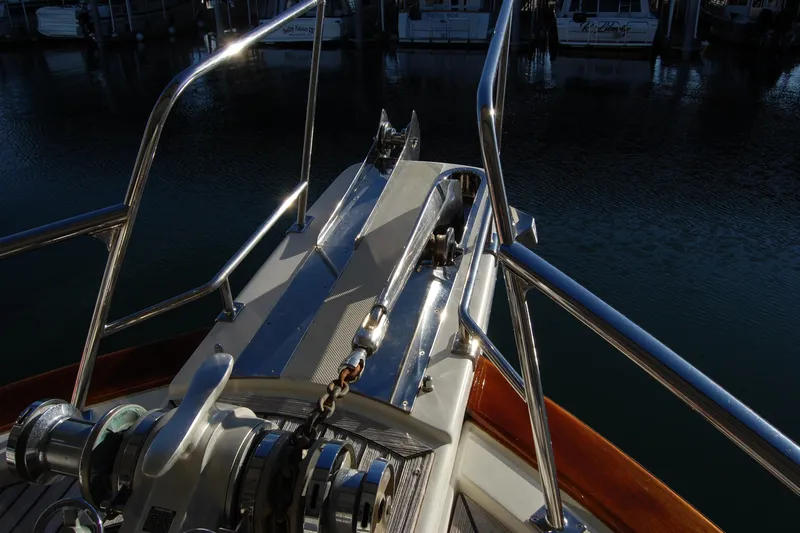 Miss Daisy Yacht Photos Pics Bow of a 2005 Fleming boat with anchor chain and railing.