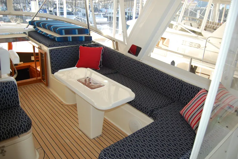 Miss Daisy Yacht Photos Pics Luxurious 2005 Fleming yacht interior with elegant seating and nautical decor.