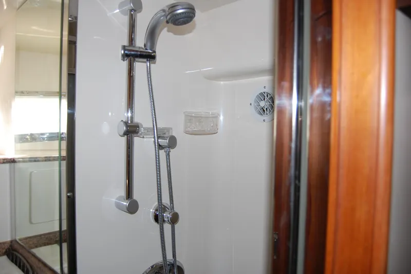 Miss Daisy Yacht Photos Pics Luxury shower in 2005 Fleming yacht bathroom with chrome fixtures.