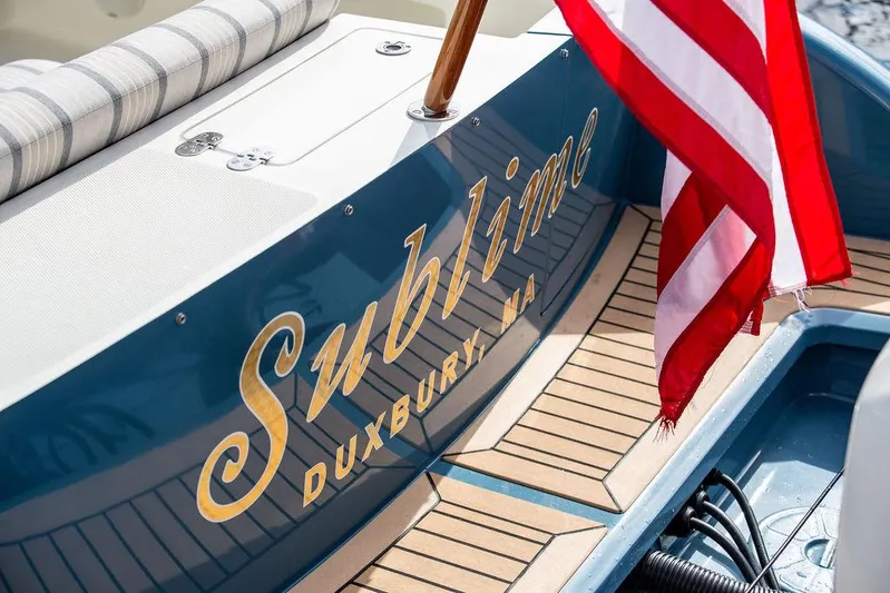Sublime Yacht Photos Pics Hinckley 35 boat "Sublime" with American flag, Duxbury, MA, 2022 model.