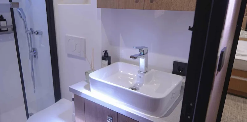  Yacht Photos Pics Modern bathroom interior on 2023 Gulet yacht with sleek sink and shower.