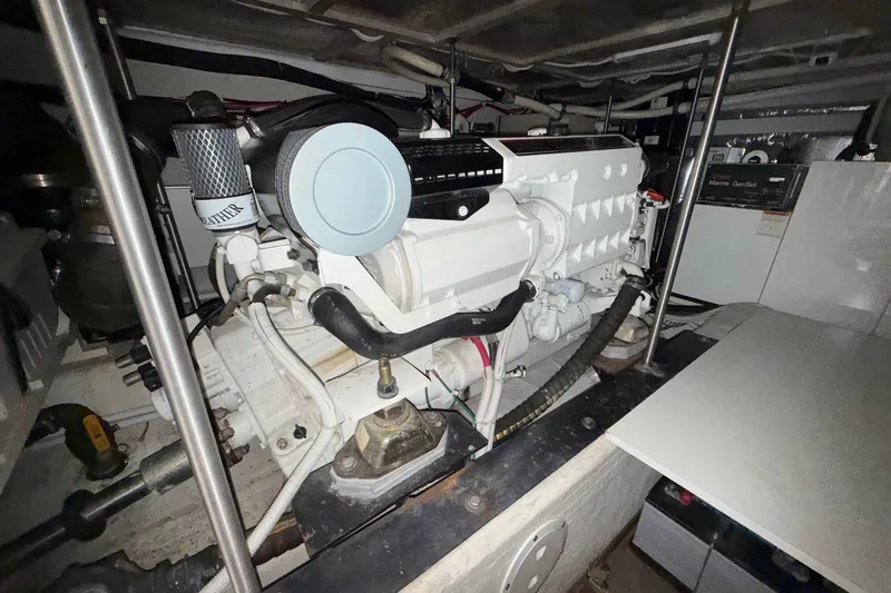  Yacht Photos Pics Engine room of 2002 Carver 570 Voyager Pilothouse with visible machinery and components.