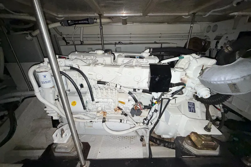 Yacht Photos Pics Engine room of 2002 Carver 570 Voyager Pilothouse with visible machinery and components.