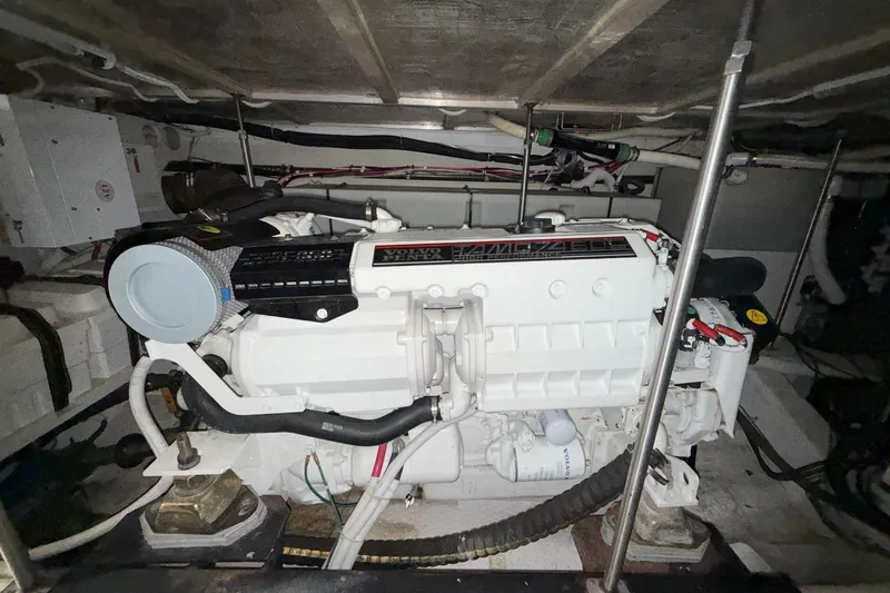  Yacht Photos Pics Engine room of 2002 Carver 570 Voyager Pilothouse with Volvo Penta engine.