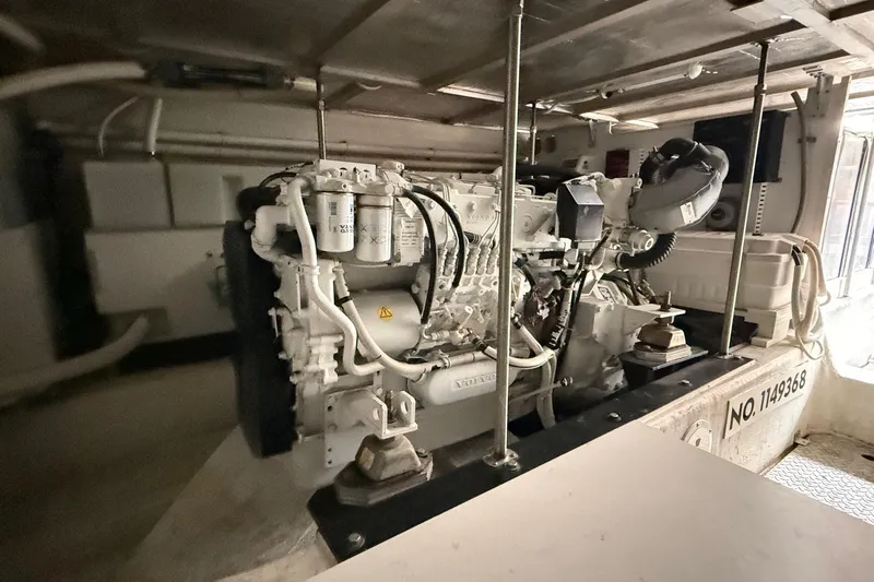  Yacht Photos Pics Engine room of 2002 Carver 570 Voyager Pilothouse with visible machinery and components.