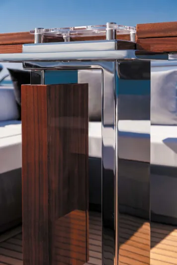  Yacht Photos Pics Luxury yacht interior detail of 2025 Riva Folgore, featuring sleek wood and chrome finishes.