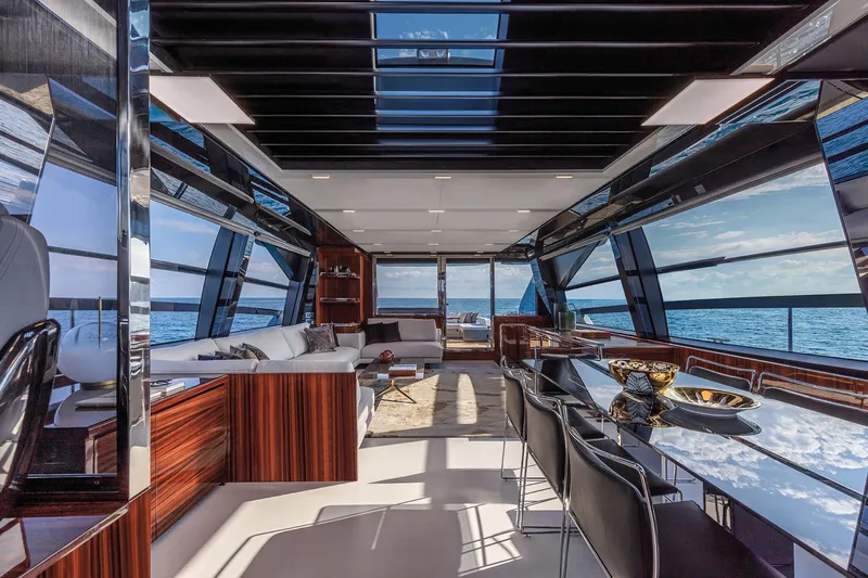  Yacht Photos Pics Luxurious interior of 2025 Riva Folgore yacht with modern design and ocean view.