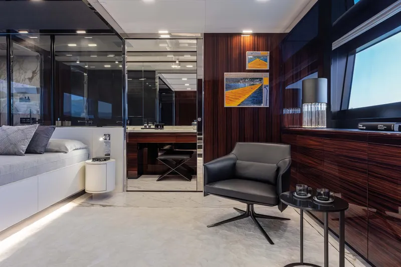  Yacht Photos Pics Luxurious interior of 2025 Riva Folgore yacht with modern furnishings and elegant decor.