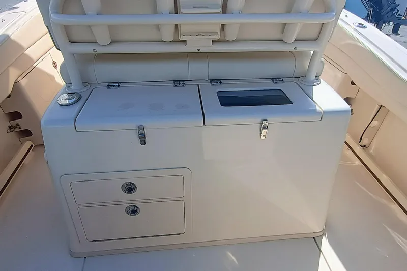 271-508 Brokerage Joe Yacht Photos Pics 2023 Grady-White Canyon 271 boat interior with storage compartments and seating.