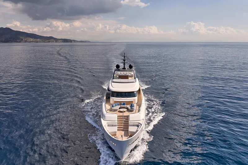 M/y K2 Yacht Photos Pics Luxurious 2024 Sanlorenzo SD118/156 yacht cruising on open sea under cloudy sky.