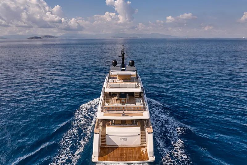 M/y K2 Yacht Photos Pics Luxurious 2024 Sanlorenzo SD118/156 yacht cruising on open sea under clear skies.