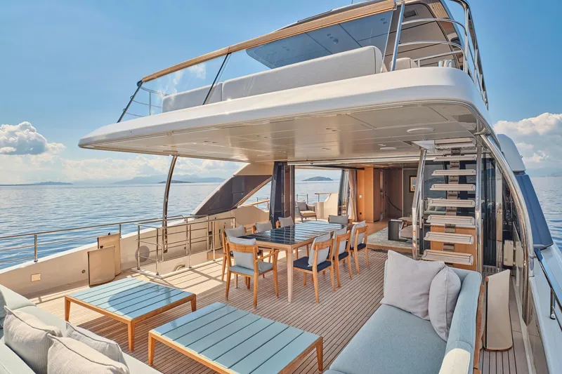 M/y K2 Yacht Photos Pics Luxurious 2024 Sanlorenzo SD118/156 yacht with elegant outdoor seating and dining area.