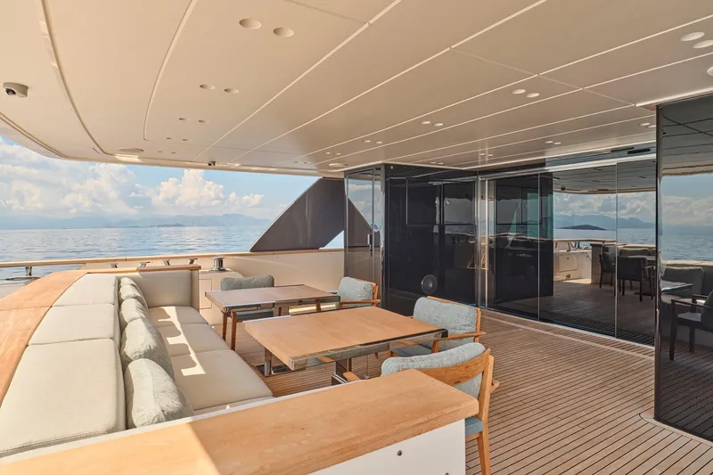 M/y K2 Yacht Photos Pics Luxurious 2024 Sanlorenzo SD118/156 yacht deck with elegant seating and ocean view.