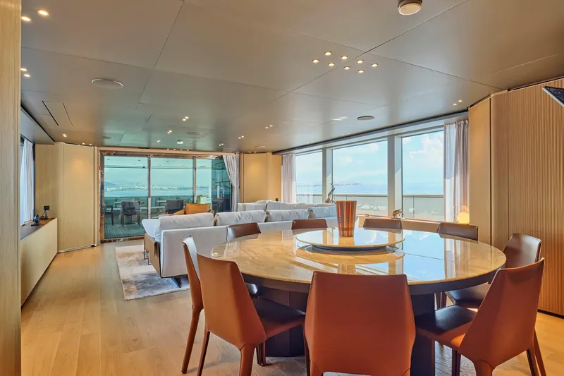 M/y K2 Yacht Photos Pics Luxurious interior of 2024 Sanlorenzo SD118/156 yacht with elegant dining area and ocean view.