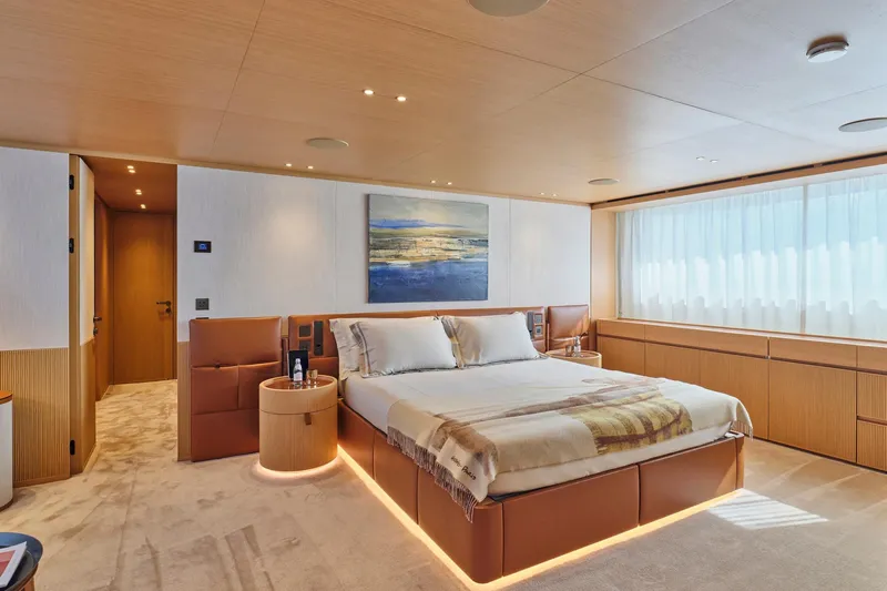 M/y K2 Yacht Photos Pics Luxurious bedroom interior of 2024 Sanlorenzo SD118/156 yacht, featuring modern design and elegant furnishings.