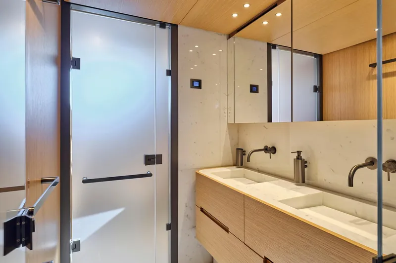 M/y K2 Yacht Photos Pics Luxurious bathroom in 2024 Sanlorenzo SD118/156 yacht with modern fixtures and dual sinks.