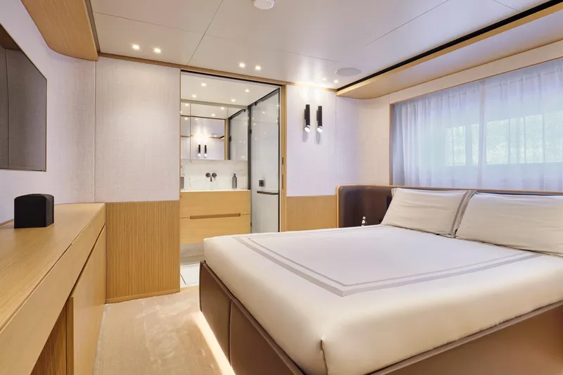 M/y K2 Yacht Photos Pics Luxurious bedroom interior of 2024 Sanlorenzo SD118/156 yacht, featuring modern design and elegant furnishings.