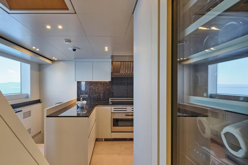 M/y K2 Yacht Photos Pics Modern kitchen interior on 2024 Sanlorenzo SD118/156 yacht, featuring sleek design and ocean view.