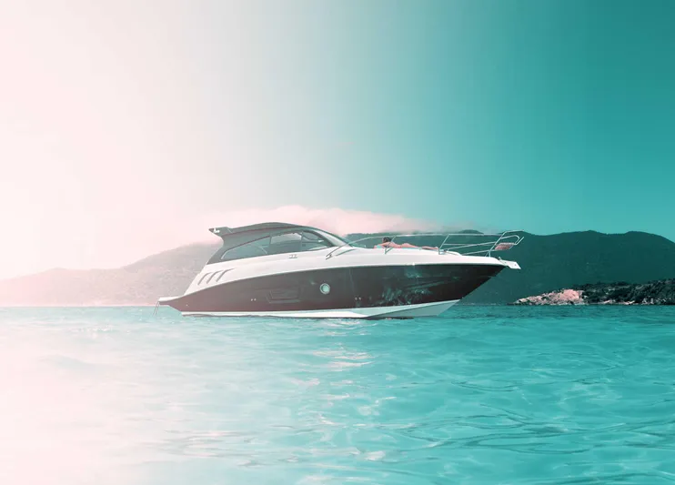 Custom Order Your 355 Today! Yacht Photos Pics 2025 Hanover 355 Outboard boat on serene turquoise water, scenic mountain backdrop.