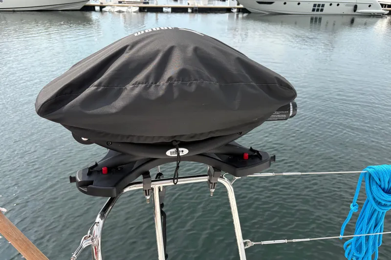 Too Impulsive Yacht Photos Pics Covered grill on Lagoon 380 S2 yacht, docked at marina, 2014 model.