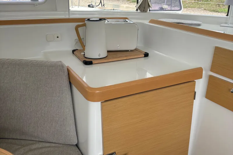 Too Impulsive Yacht Photos Pics Interior of 2014 Lagoon 380 S2 yacht with modern kitchen appliances.