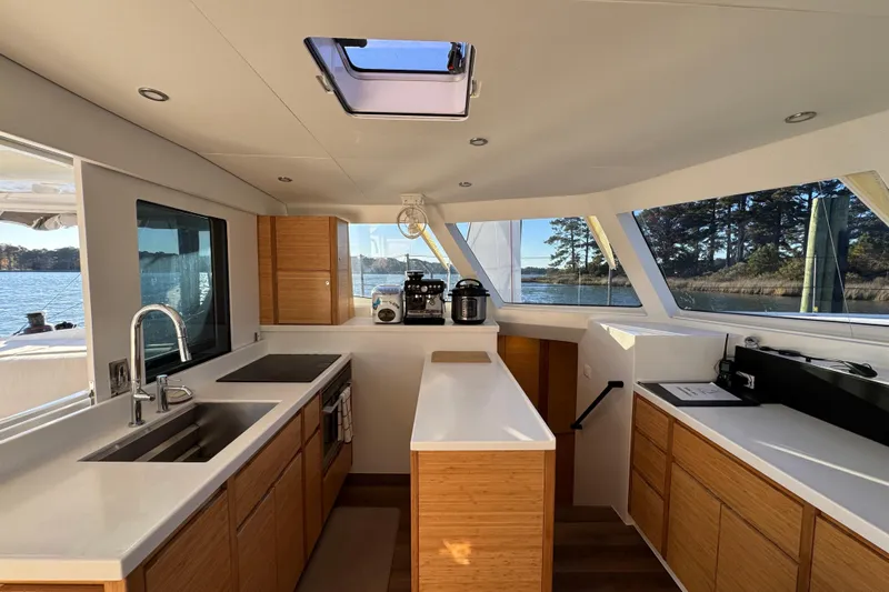 Hokule'a Yacht Photos Pics Modern kitchen interior on 2024 Balance 482 yacht with sleek design and scenic views.