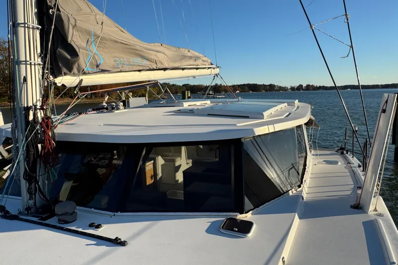 Hokule'a Yacht Photos Pics 2024 Balance 482 sailboat on water, showcasing sleek design and modern features.
