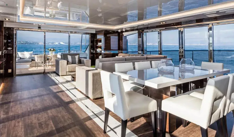  Yacht Photos Pics Luxurious interior of 2025 Pearl 95 yacht with ocean view and modern furnishings.