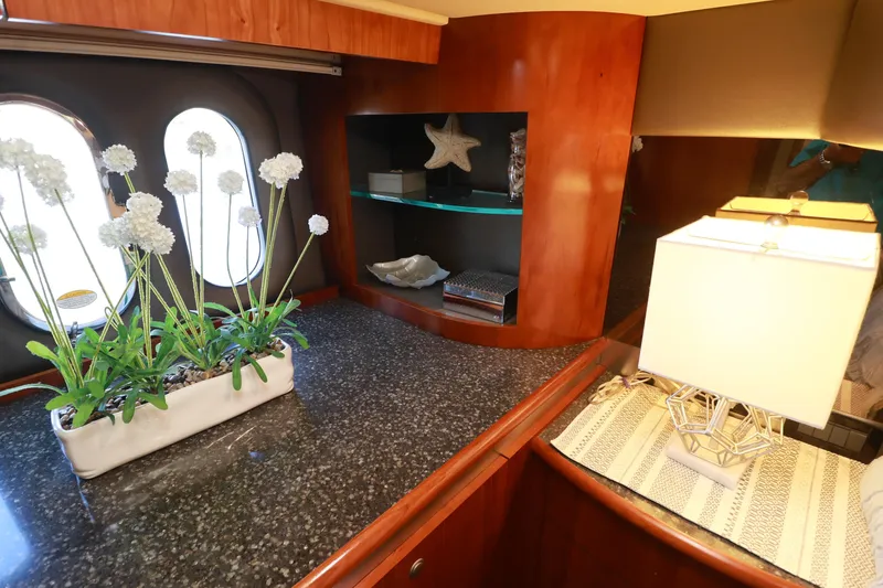 Nauti Buoy Yacht Photos Pics Luxurious 2007 Cruisers 520 Express yacht interior with elegant decor and ambient lighting.