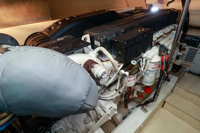 Nauti Buoy Yacht Photos Pics Engine room of a 2007 Cruisers 520 Express yacht, showcasing detailed machinery components.