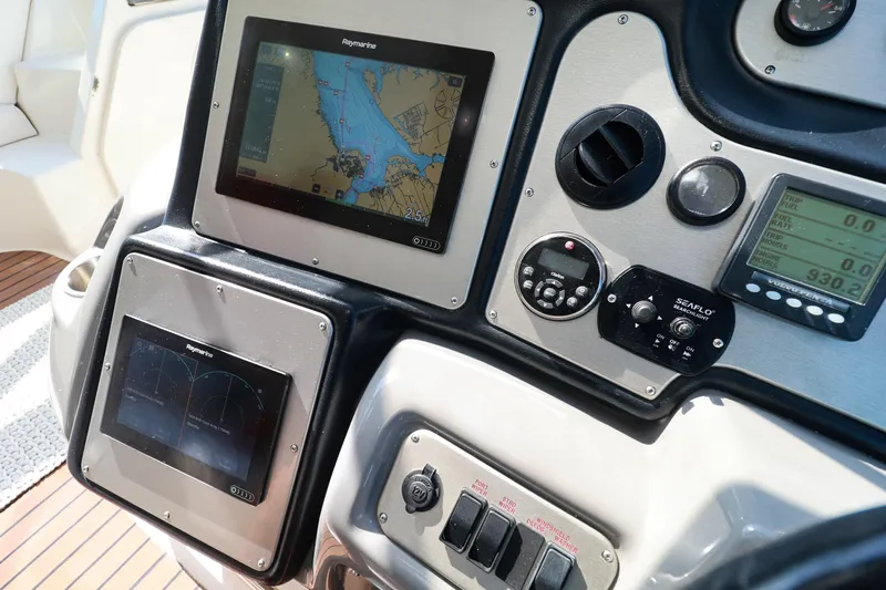 Nauti Buoy Yacht Photos Pics Control panel of a 2007 Cruisers 520 Express yacht with navigation displays.