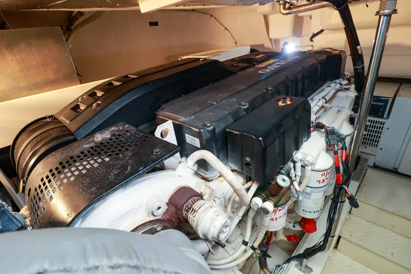 Nauti Buoy Yacht Photos Pics Engine room of 2007 Cruisers 520 Express yacht with Volvo machinery.