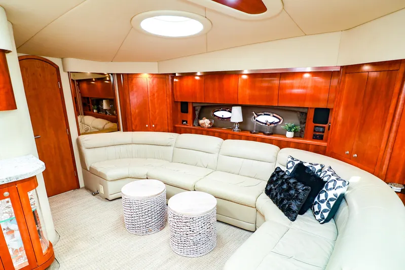 Nauti Buoy Yacht Photos Pics Luxurious 2007 Cruisers 520 Express yacht interior with elegant seating and wooden cabinetry.