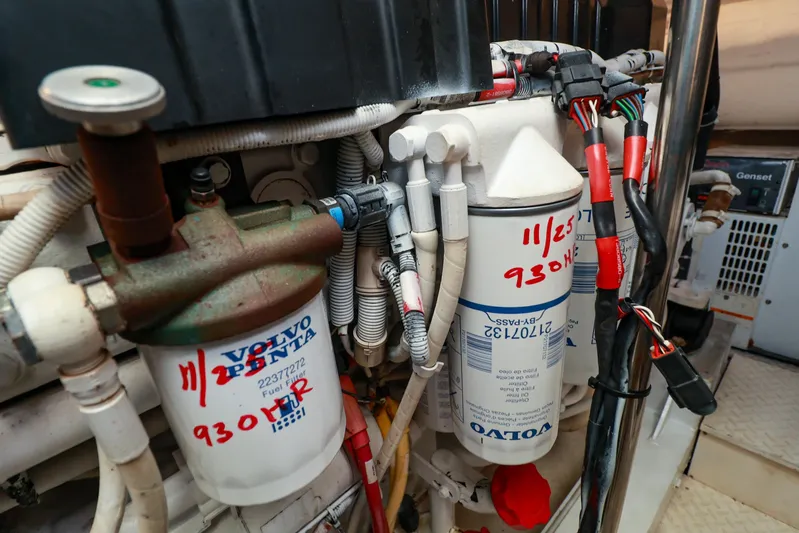 Nauti Buoy Yacht Photos Pics Engine room of 2007 Cruisers 520 Express with Volvo Penta fuel filters and wiring.