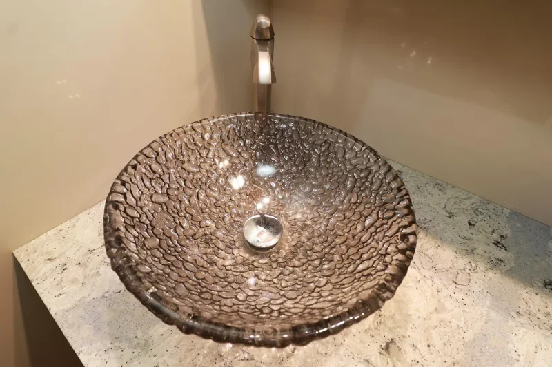 Nauti Buoy Yacht Photos Pics Textured glass vessel sink on marble countertop, 2007 Cruisers 520 Express.