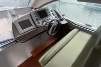 2008 Intermare 50 Fly Bridge yacht helm with modern controls and leather seating.