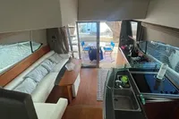 Interior of 2008 Intermare 50 Fly Bridge yacht with modern kitchen and seating area.