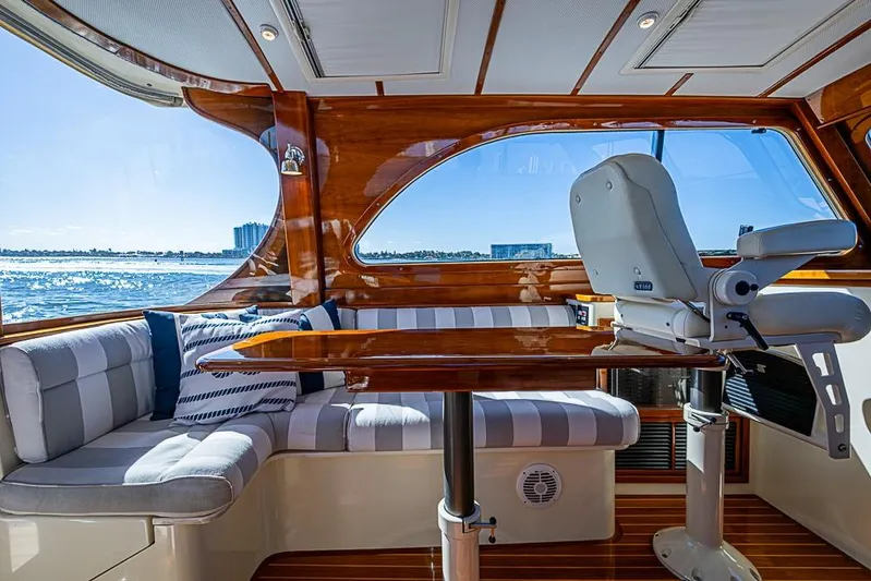 Skylark Yacht Photos Pics Luxurious 2008 Hinckley Talaria 44 MY yacht interior with elegant seating and polished wood finishes.