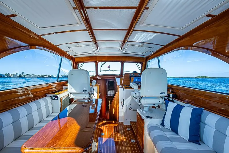 Skylark Yacht Photos Pics Luxurious 2008 Hinckley Talaria 44 MY yacht interior with elegant wood finish and scenic ocean view.