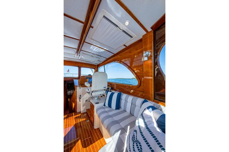 Skylark Yacht Photos Pics Luxurious interior of 2008 Hinckley Talaria 44 MY yacht with elegant wood finish.