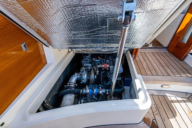 Skylark Yacht Photos Pics Engine compartment of 2008 Hinckley Talaria 44 MY yacht, showcasing mechanical components.