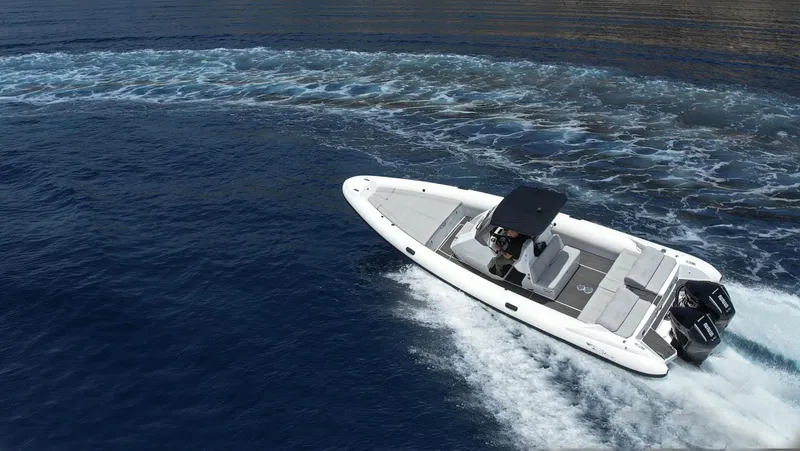  Yacht Photos Pics 2025 Ribco Venom 30 speedboat cruising on open water.