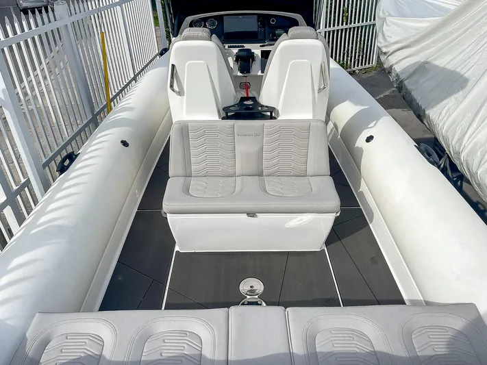  Yacht Photos Pics 2025 Ribco Venom 30 boat interior with sleek seating and modern design.